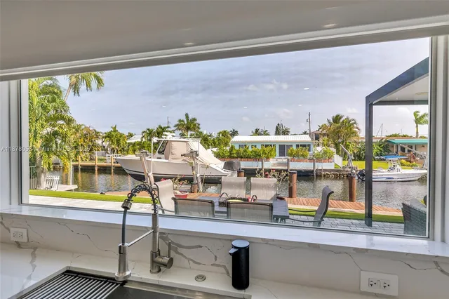 an aerial view of house with yard