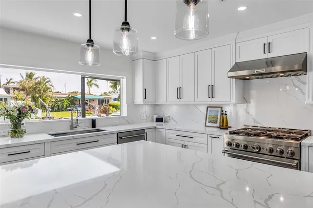 a view of living room with furniture and entryway