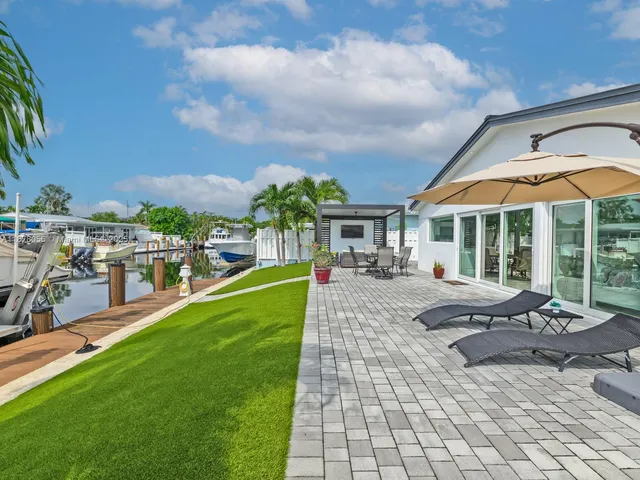 an aerial view of city and swimming pool