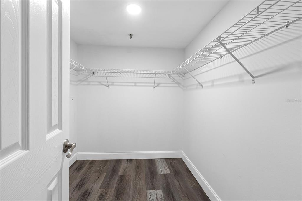 14001 Gulf Boulevard, Unit 404 Madeira Beach, FL 33708 - Photo 12 of 24 a view of a room with racks on the wall