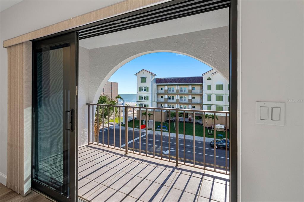 14001 Gulf Boulevard, Unit 404 Madeira Beach, FL 33708 - Photo 4 of 24 a view of a balcony from door