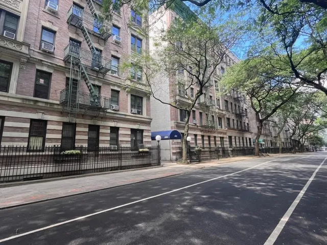 a view of a house with a street