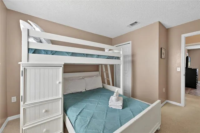 a kitchen with a sink and refrigerator