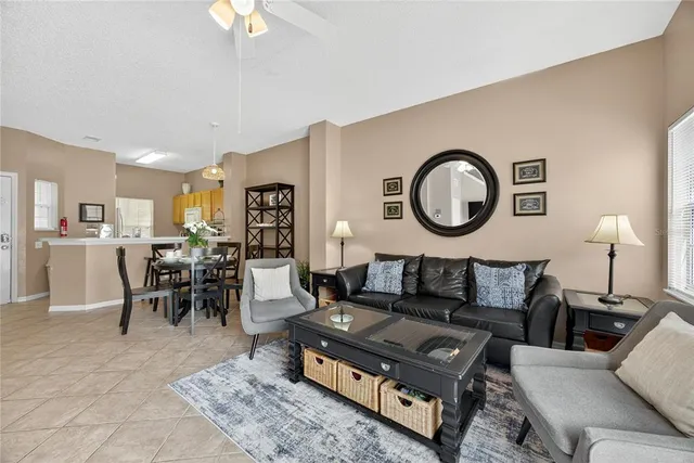 a living room with furniture and a table
