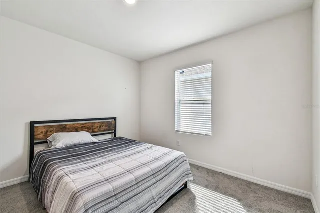 a view of a living room filled with furniture