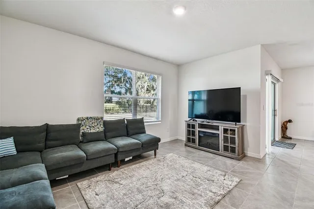 a room with a bed and a window