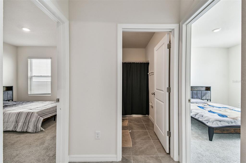 33635 Field Maple Loop Wesley Chapel, FL 33545 - Photo 9 of 35 a view of living room and bedroom