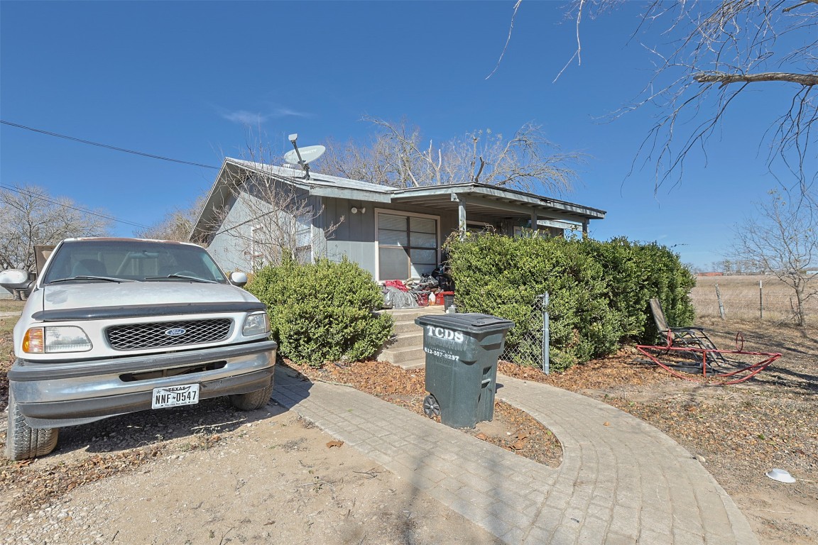 1403 Harris Hill Road San Marcos, TX 78666 - Photo 12 of 13 a view of a backyard with sitting area