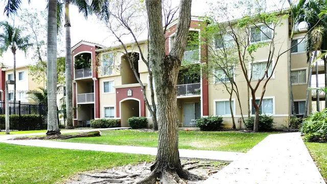 a view of a swimming pool with a garden