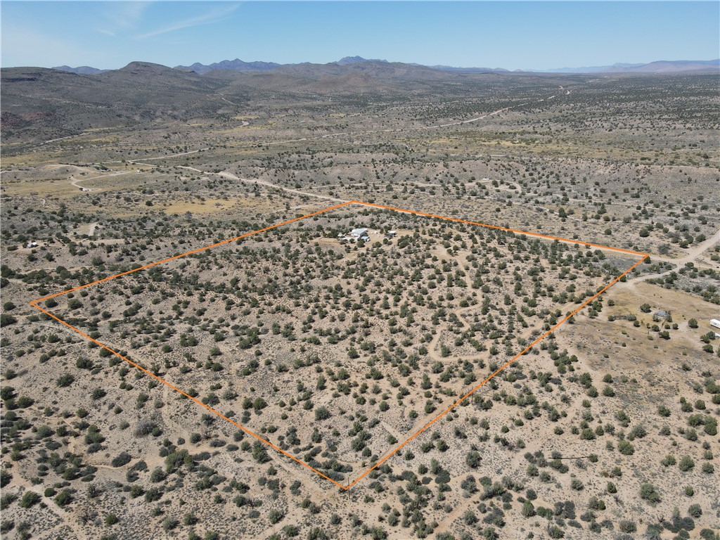 14224 East Randy Ranch Road Kingman, AZ 86401 - Photo 74 of 75 Expansive desert landscape with clear property boundary lines, offering a serene and natural environment