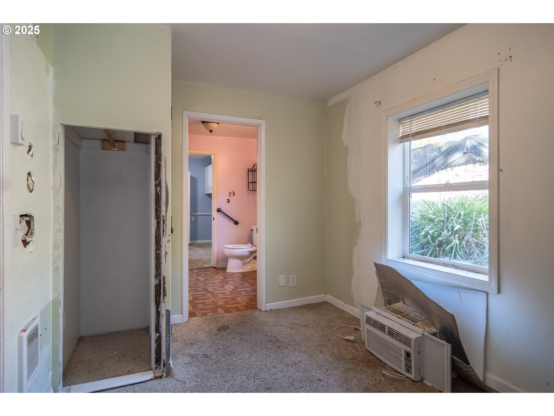 839 Union Gap Loop Oakland, OR 97462 - Photo 10 of 24 a view of room with hardwood floor and a bathroom