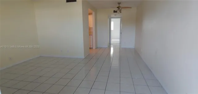 an empty room & wooden door