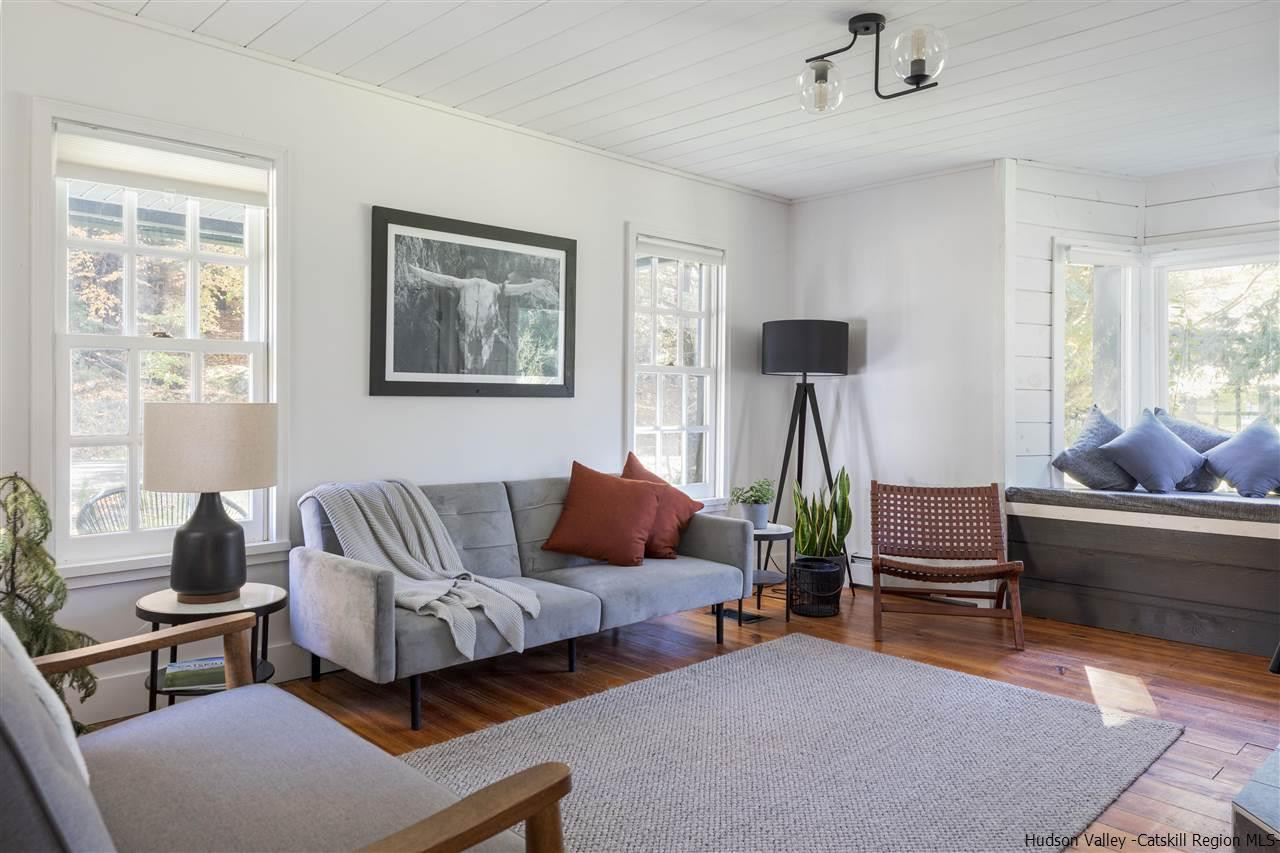9 Clark A Road Woodbourne, NY 12788 - Photo 17 of 35 a living room with furniture and a window