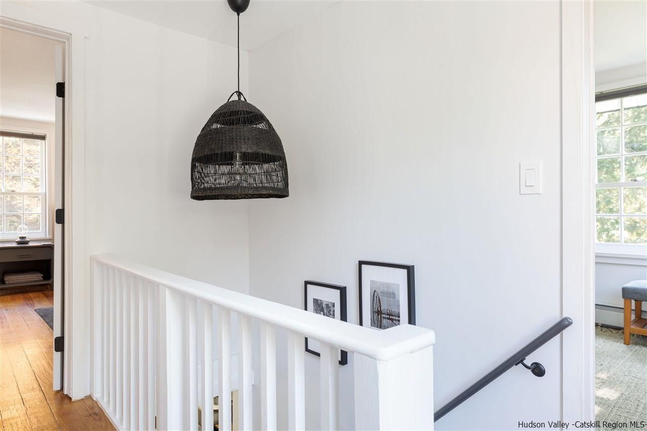 9 Clark A Road Woodbourne, NY 12788 - Photo 23 of 35 a view of a hallway to a livingroom with furniture and window