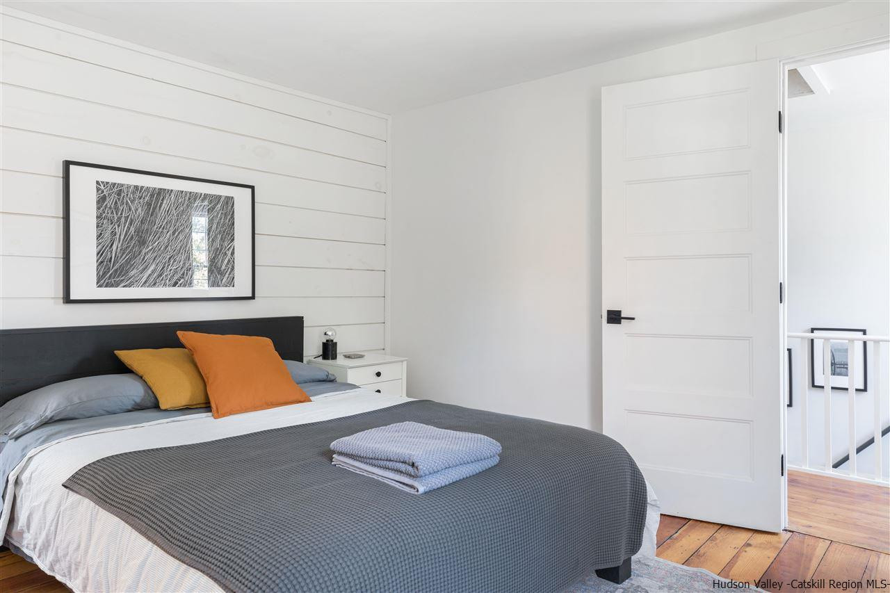 9 Clark A Road Woodbourne, NY 12788 - Photo 24 of 35 a bedroom with a bed and a couch