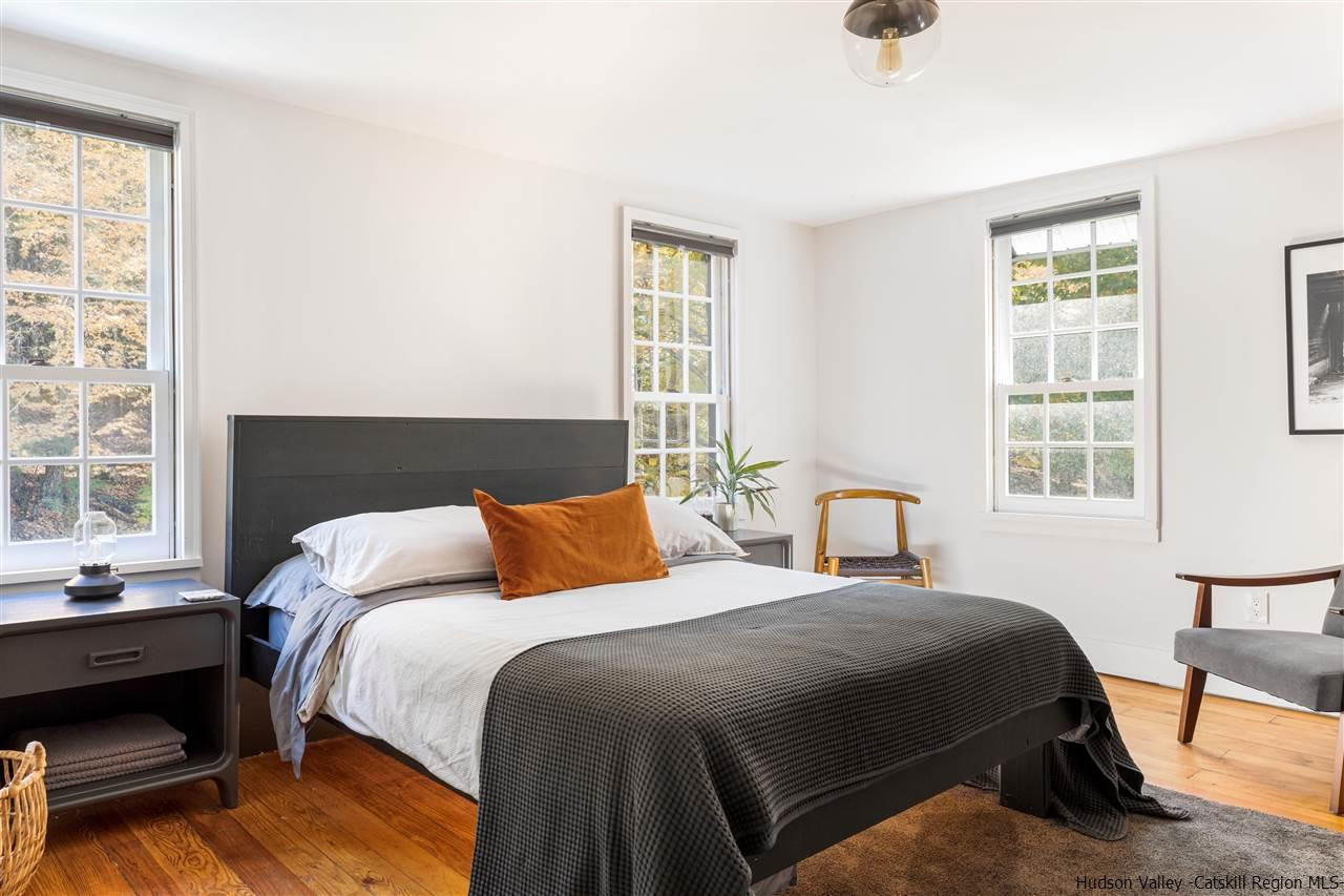 9 Clark A Road Woodbourne, NY 12788 - Photo 27 of 35 a bedroom with a bed and a window