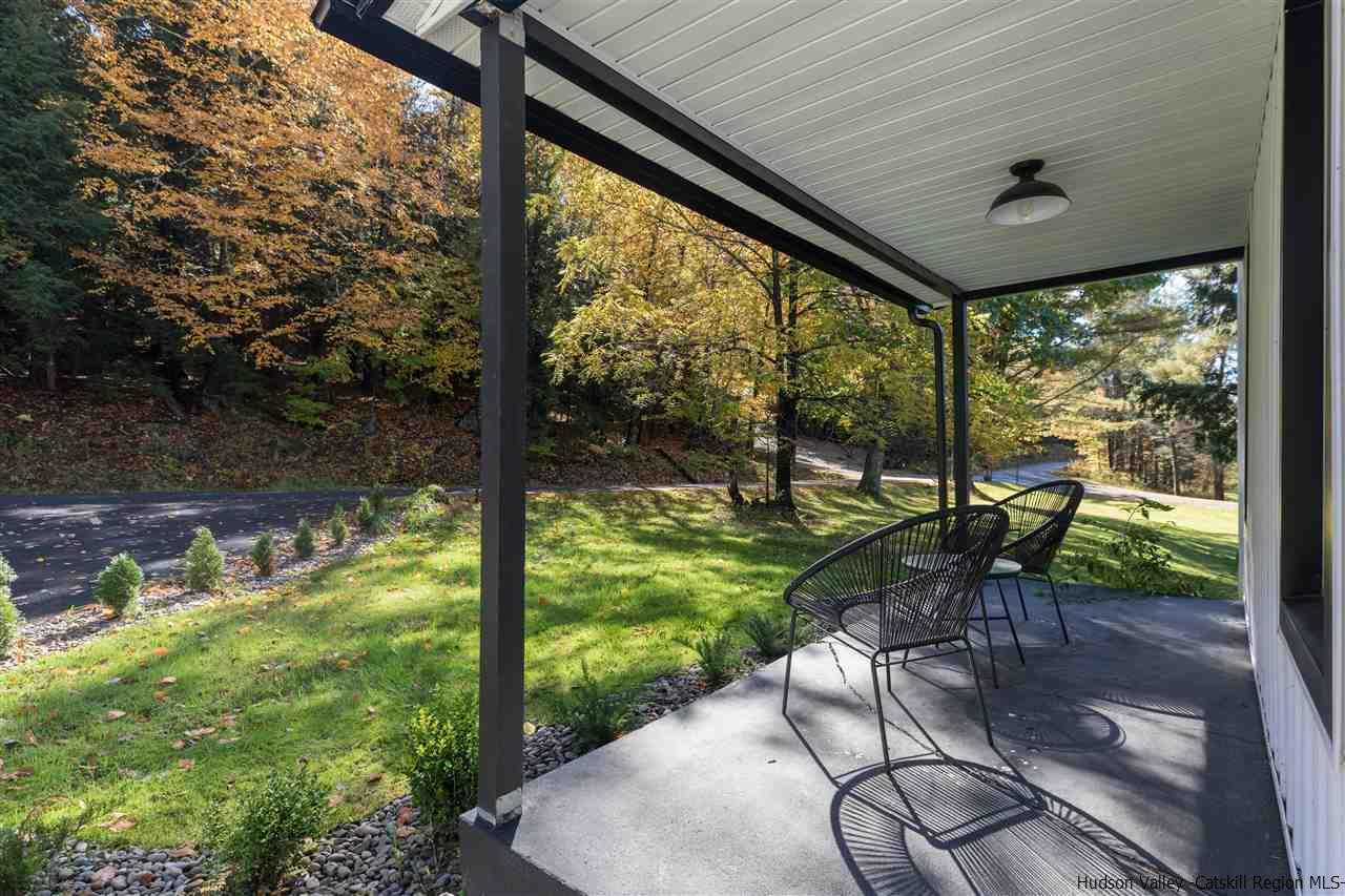 9 Clark A Road Woodbourne, NY 12788 - Photo 28 of 35 a view of a porch with furniture and garden