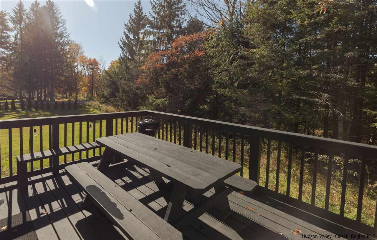 9 Clark A Road Woodbourne, NY 12788 - Photo 30 of 35 a view of a balcony with wooden floor and outdoor seating
