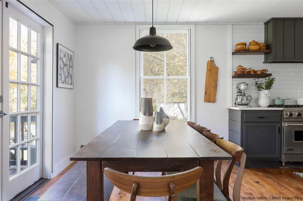 9 Clark A Road Woodbourne, NY 12788 - Photo 4 of 35 a view of a dining room with furniture window and wooden floor