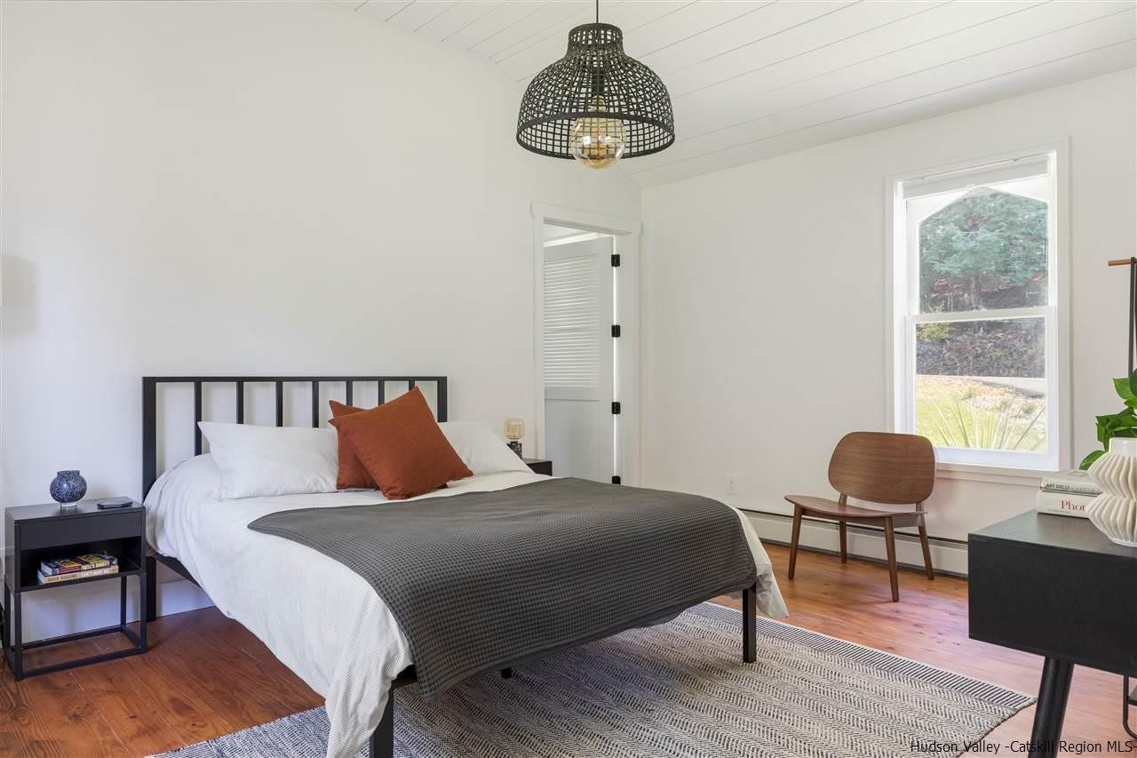 9 Clark A Road Woodbourne, NY 12788 - Photo 6 of 35 a bedroom with a bed and a window