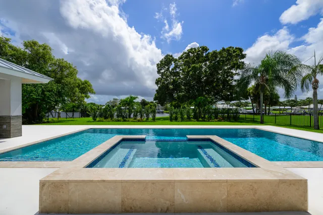 a view of a lake with a garden