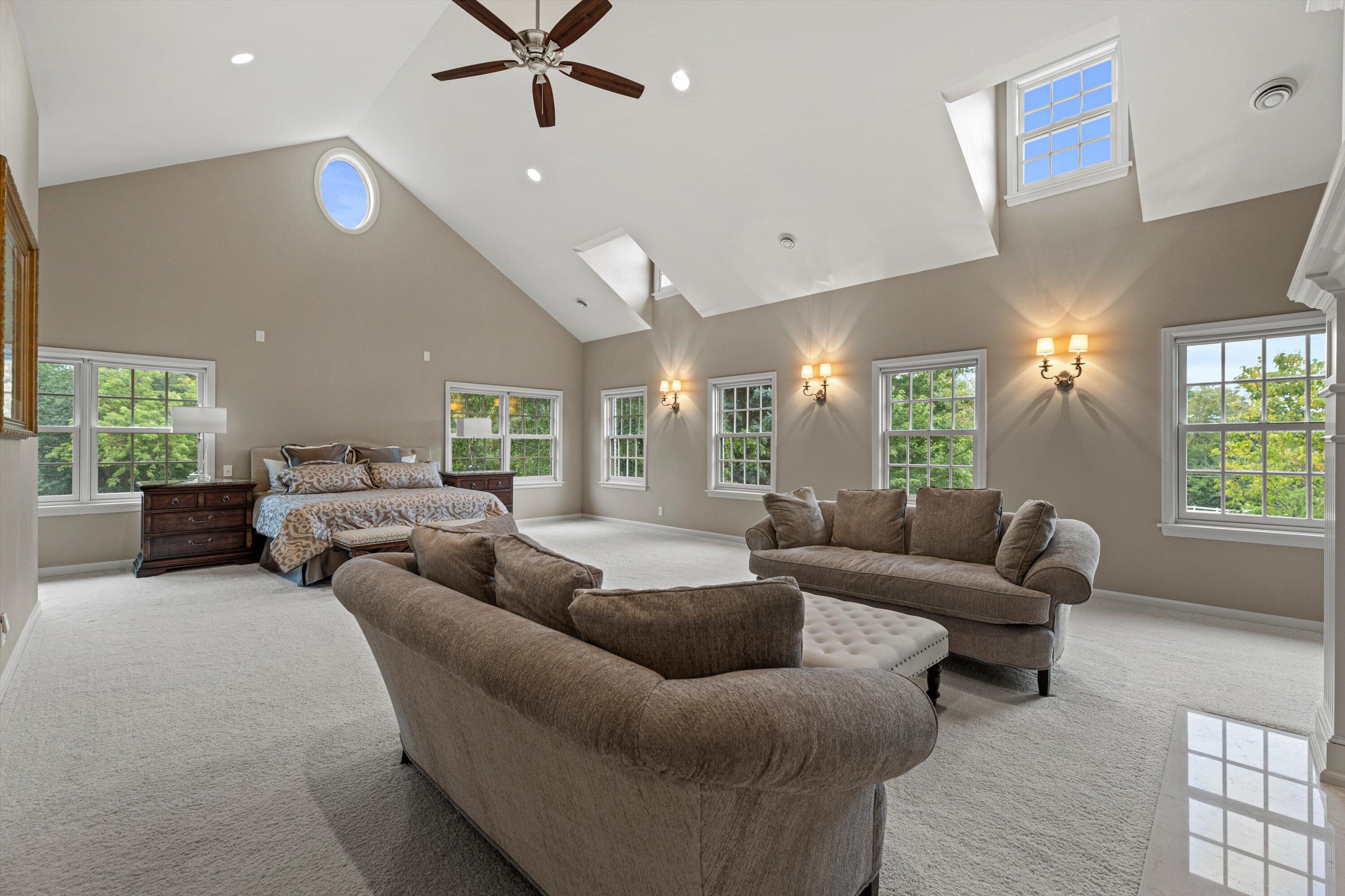 10060 North Range Line Road Mequon, WI 53092 - Photo 35 of 105 Tall ceilings with ceiling fan and recessed lighting