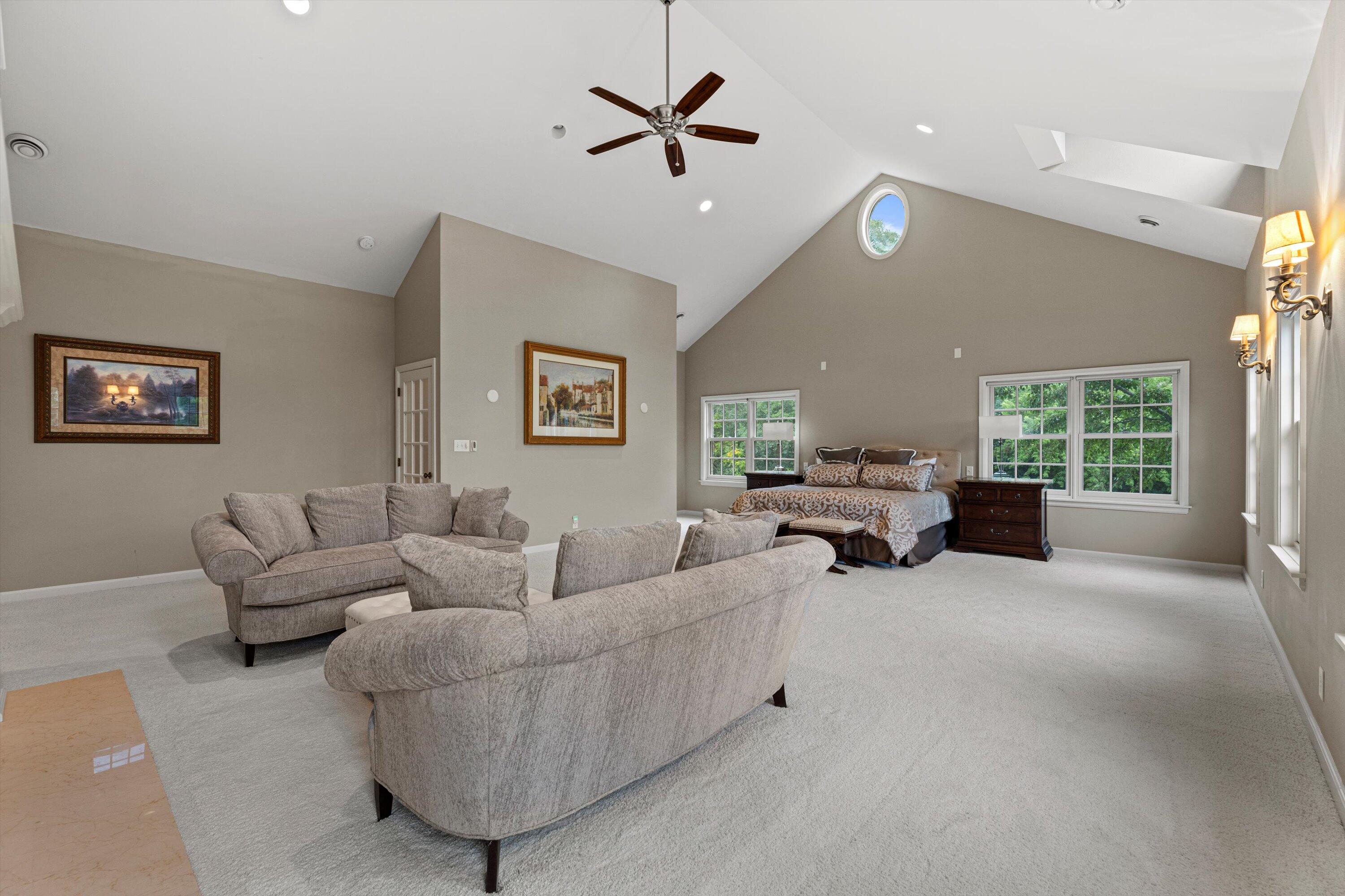 10060 North Range Line Road Mequon, WI 53092 - Photo 5 of 105 Lofted ceilings Features a sitting area with a gas fireplace