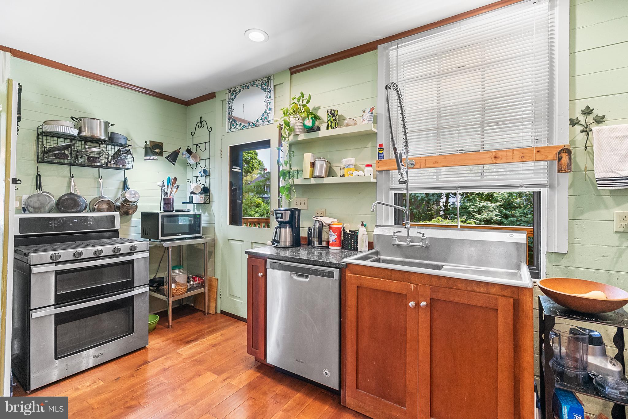 143 Barto Road Barto, PA 19504 - Photo 20 of 37 a kitchen with stainless steel appliances a stove and a refrigerator
