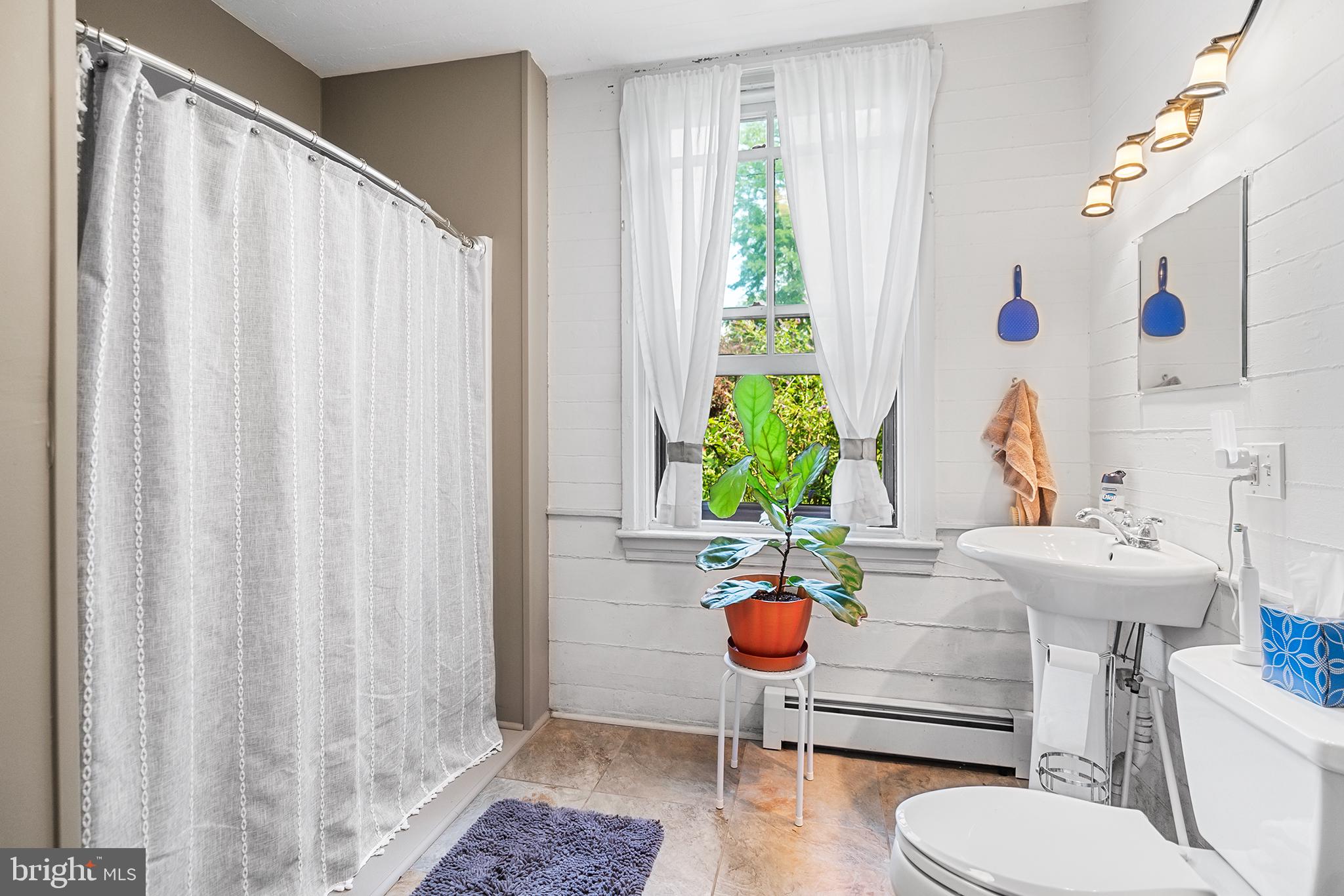 143 Barto Road Barto, PA 19504 - Photo 28 of 37 a bathroom with a sink toilet and shower