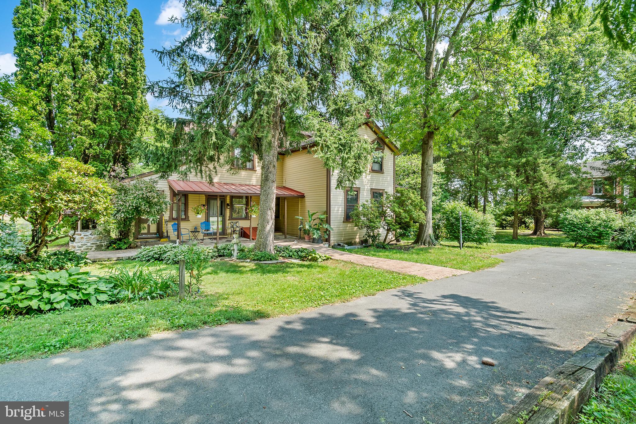 143 Barto Road Barto, PA 19504 - Photo 3 of 37 a front view of a house with a yard and porch