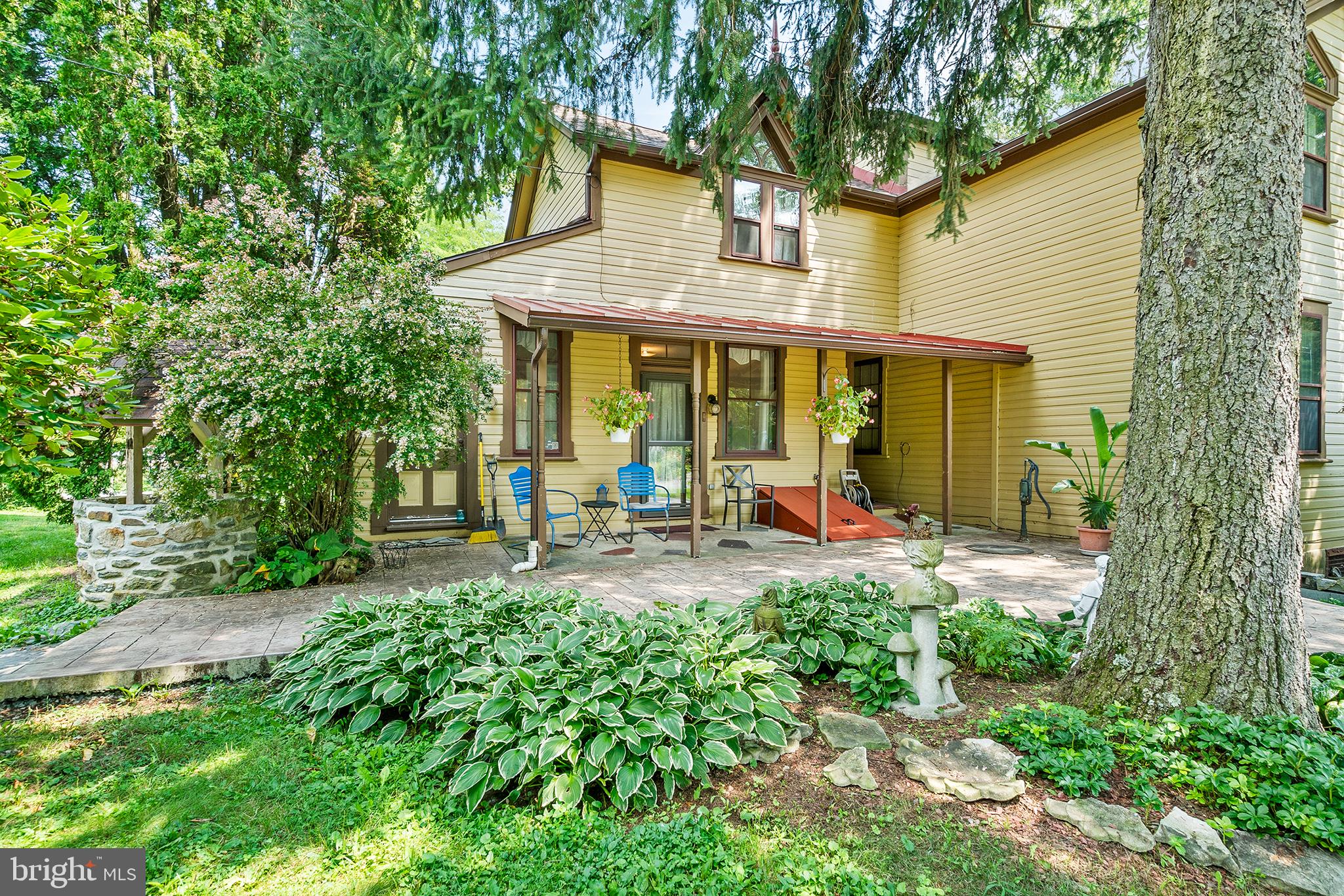 143 Barto Road Barto, PA 19504 - Photo 7 of 37 a view of a house with backyard porch and sitting area