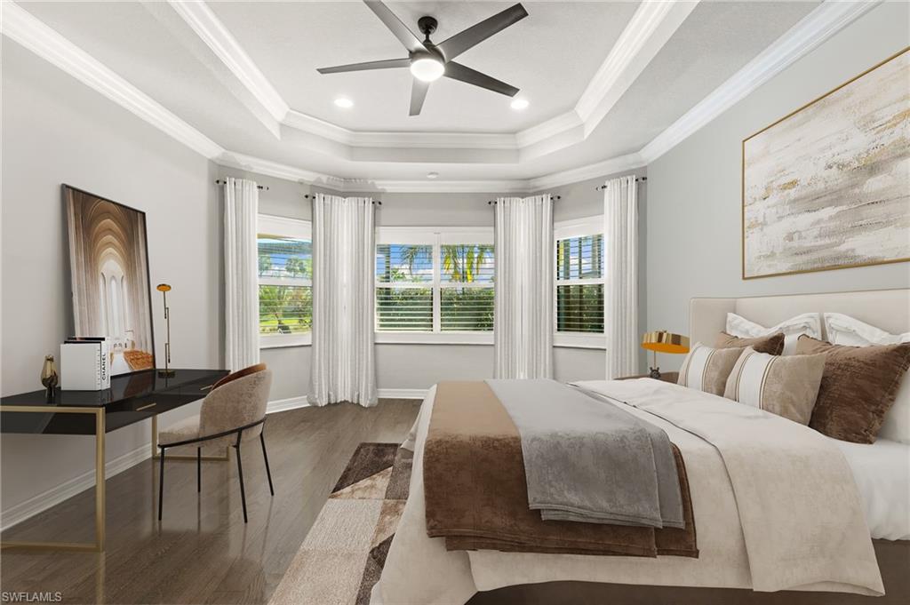 4366 Caldera Circle Naples, FL 34119 - Photo 11 of 41 a bedroom with a bed two lamps and a large window