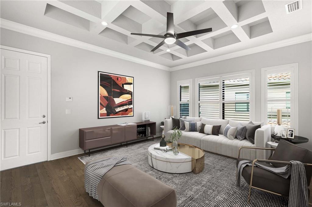 4366 Caldera Circle Naples, FL 34119 - Photo 16 of 41 a living room with furniture and a large window