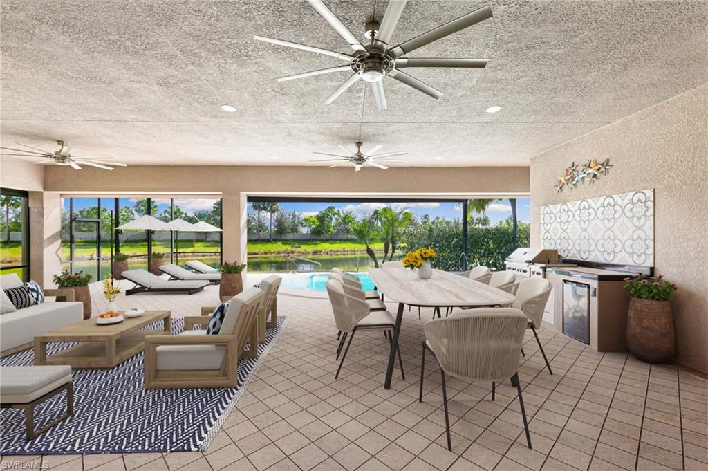 4366 Caldera Circle Naples, FL 34119 - Photo 17 of 41 a dining room with furniture a rug and a floor to ceiling window