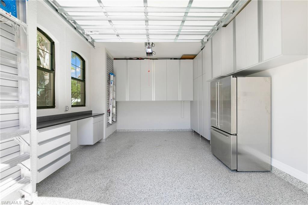 4366 Caldera Circle Naples, FL 34119 - Photo 31 of 41 a view of an empty room with a window