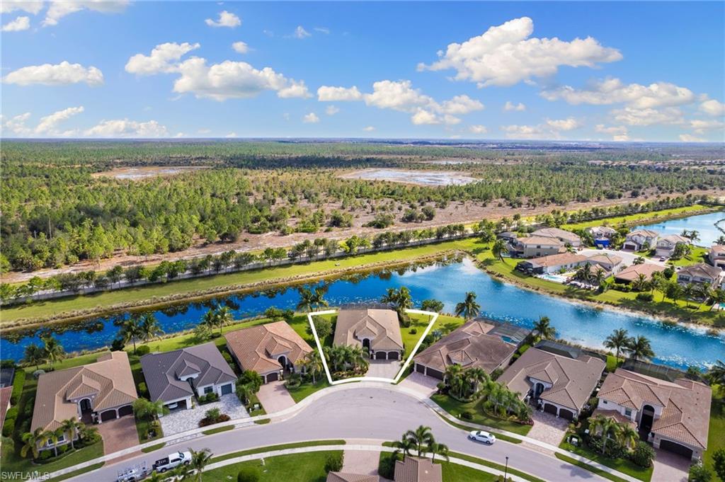 4366 Caldera Circle Naples, FL 34119 - Photo 38 of 41 an aerial view of a city