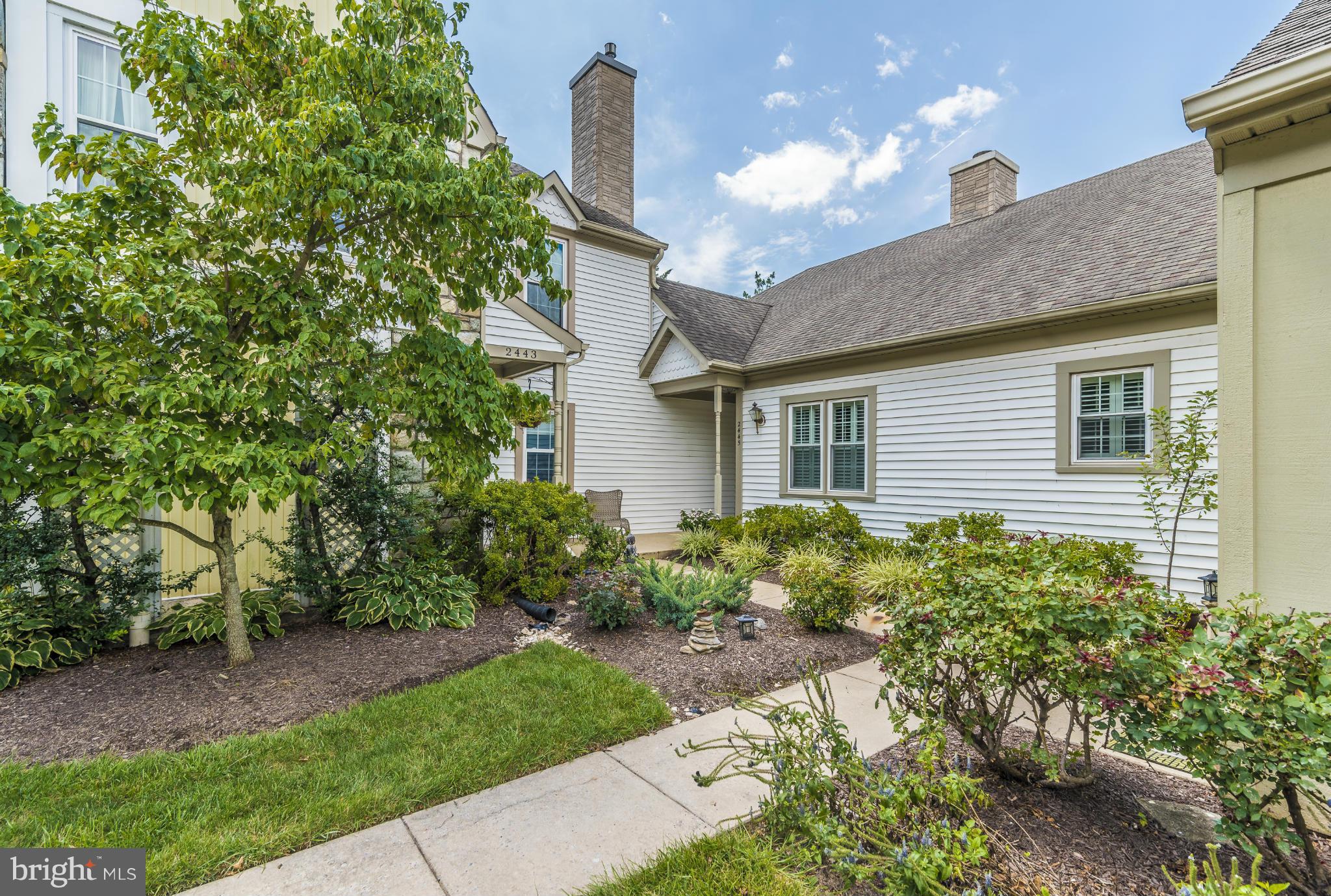 2443 Bear Den Road Frederick, MD 21701 - Photo 2 of 30 a front view of a house with garden