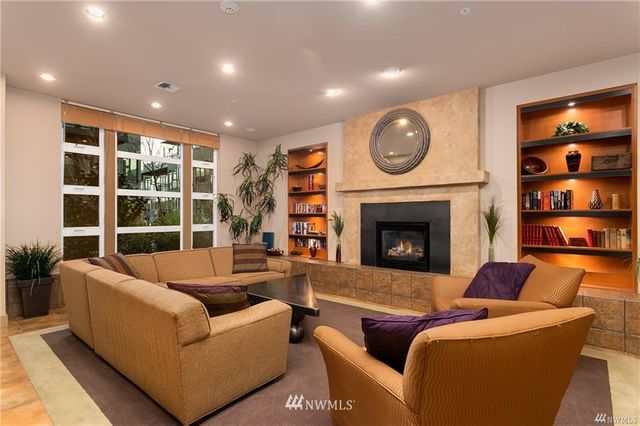 a view of a building with sitting area