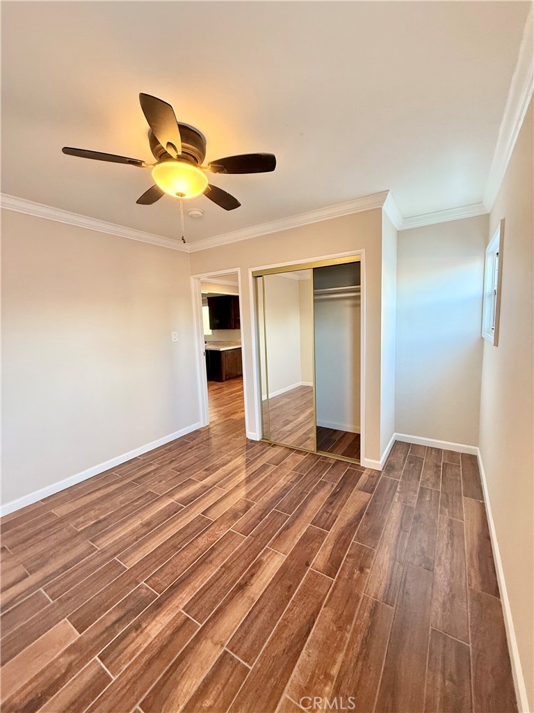 24 10th Court Hermosa Beach, CA 90254 - Photo 18 of 31 a view of empty room with wooden floor