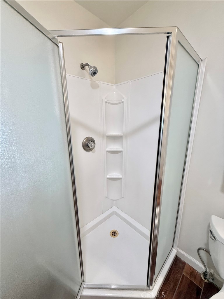 24 10th Court Hermosa Beach, CA 90254 - Photo 8 of 31 a bathroom with a glass shower door and a sink