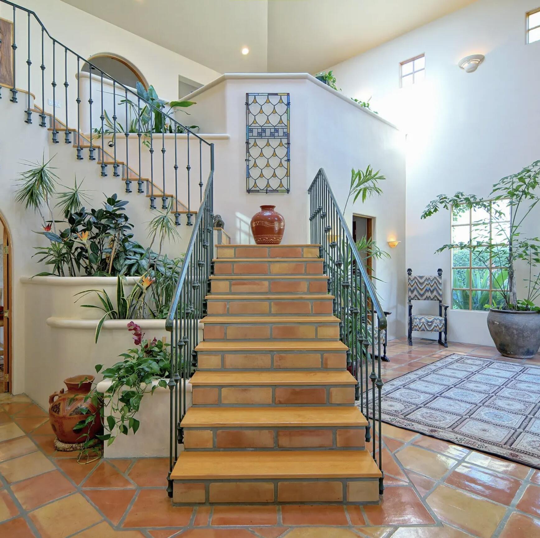 3756 Foothill Road Santa Barbara, CA 93105 - Photo 11 of 70 a view of entryway with a floor to ceiling window and potted plants