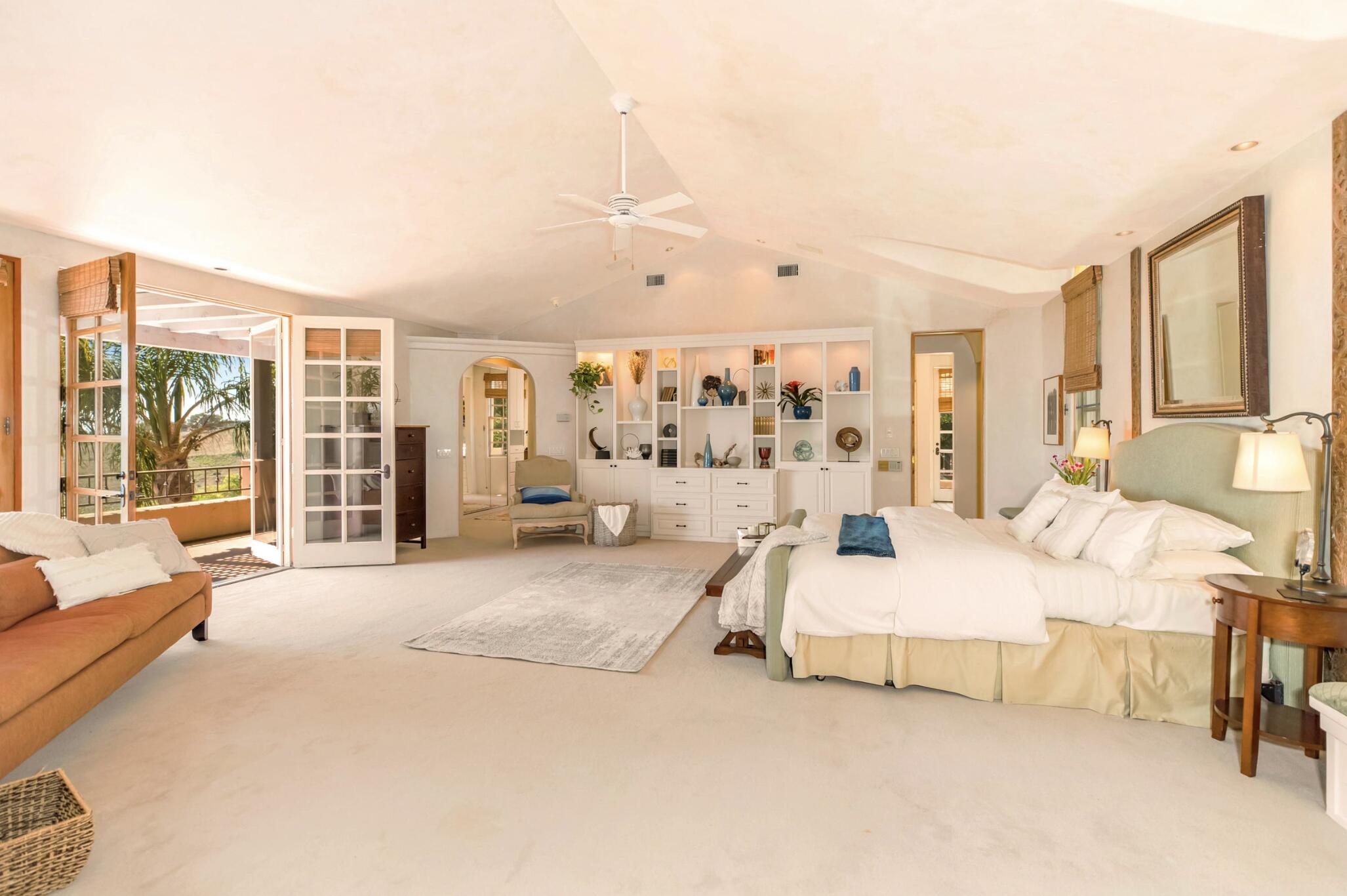 3756 Foothill Road Santa Barbara, CA 93105 - Photo 13 of 70 a spacious bedroom with a large bed and a large window