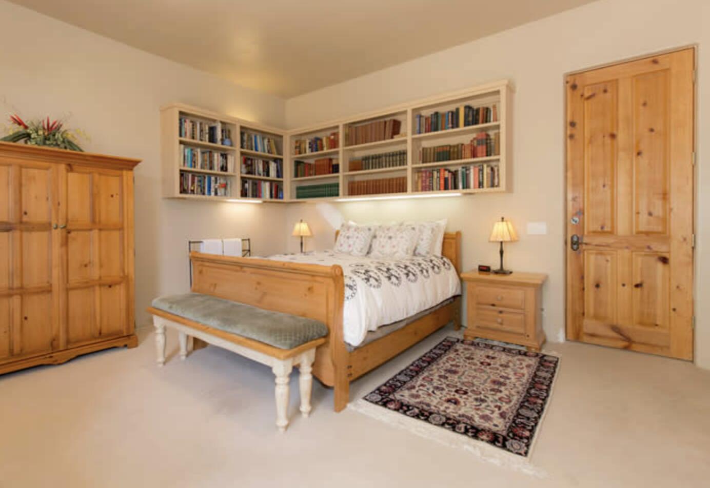 3756 Foothill Road Santa Barbara, CA 93105 - Photo 21 of 70 a bedroom with a bed and a cabinet