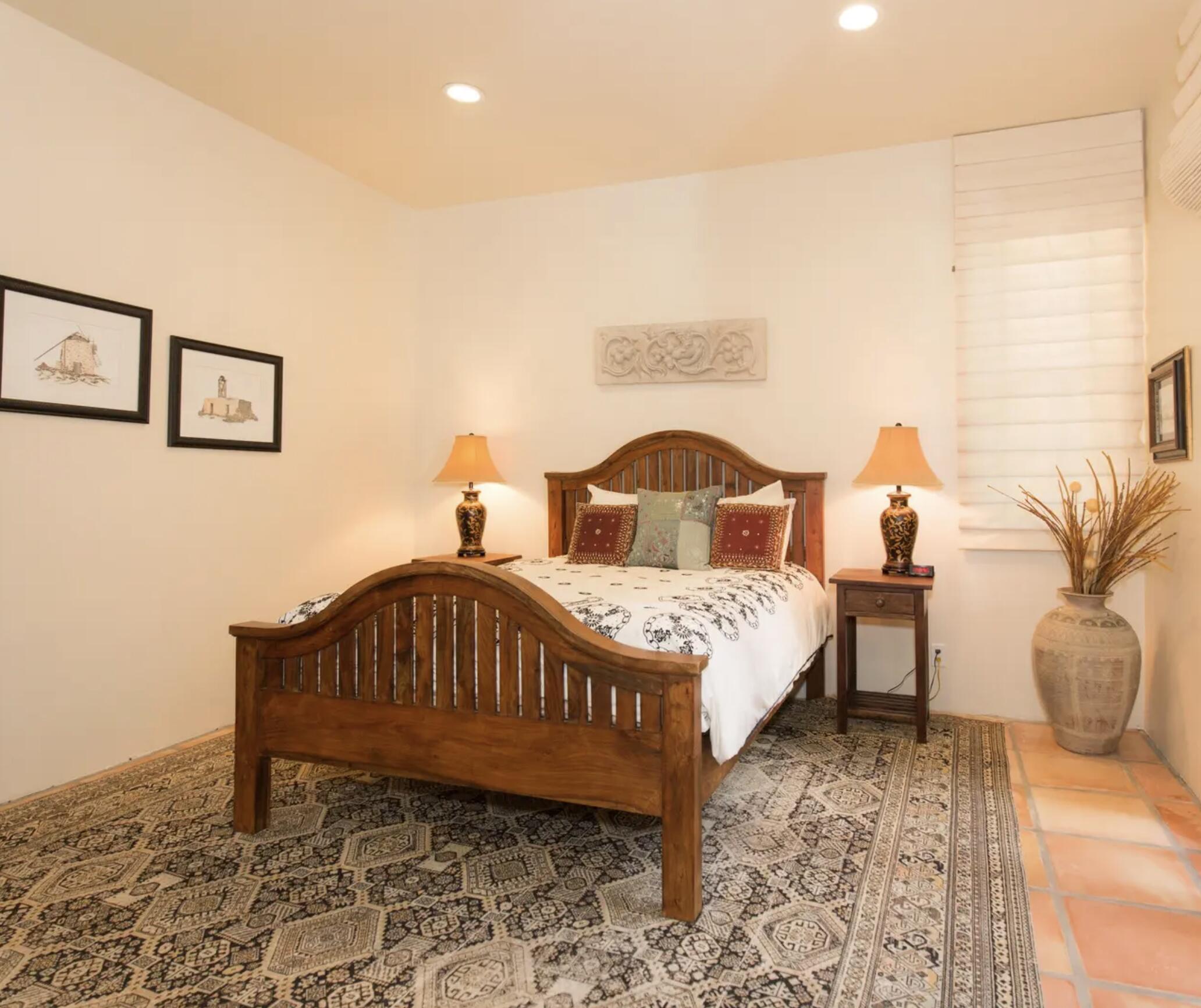 3756 Foothill Road Santa Barbara, CA 93105 - Photo 26 of 70 a bedroom with a bed table and a window