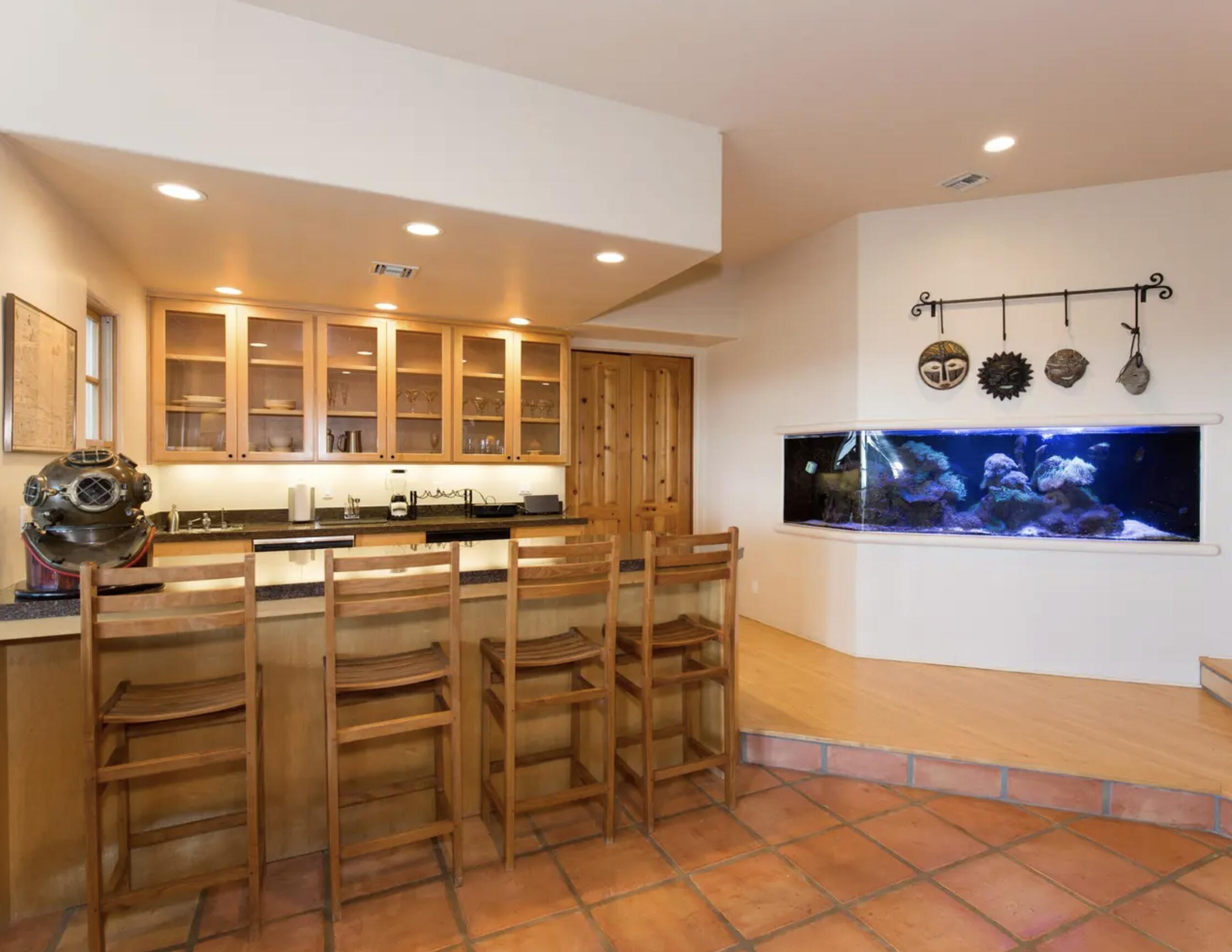3756 Foothill Road Santa Barbara, CA 93105 - Photo 27 of 70 a kitchen with stainless steel appliances kitchen island granite countertop a stove and cabinets