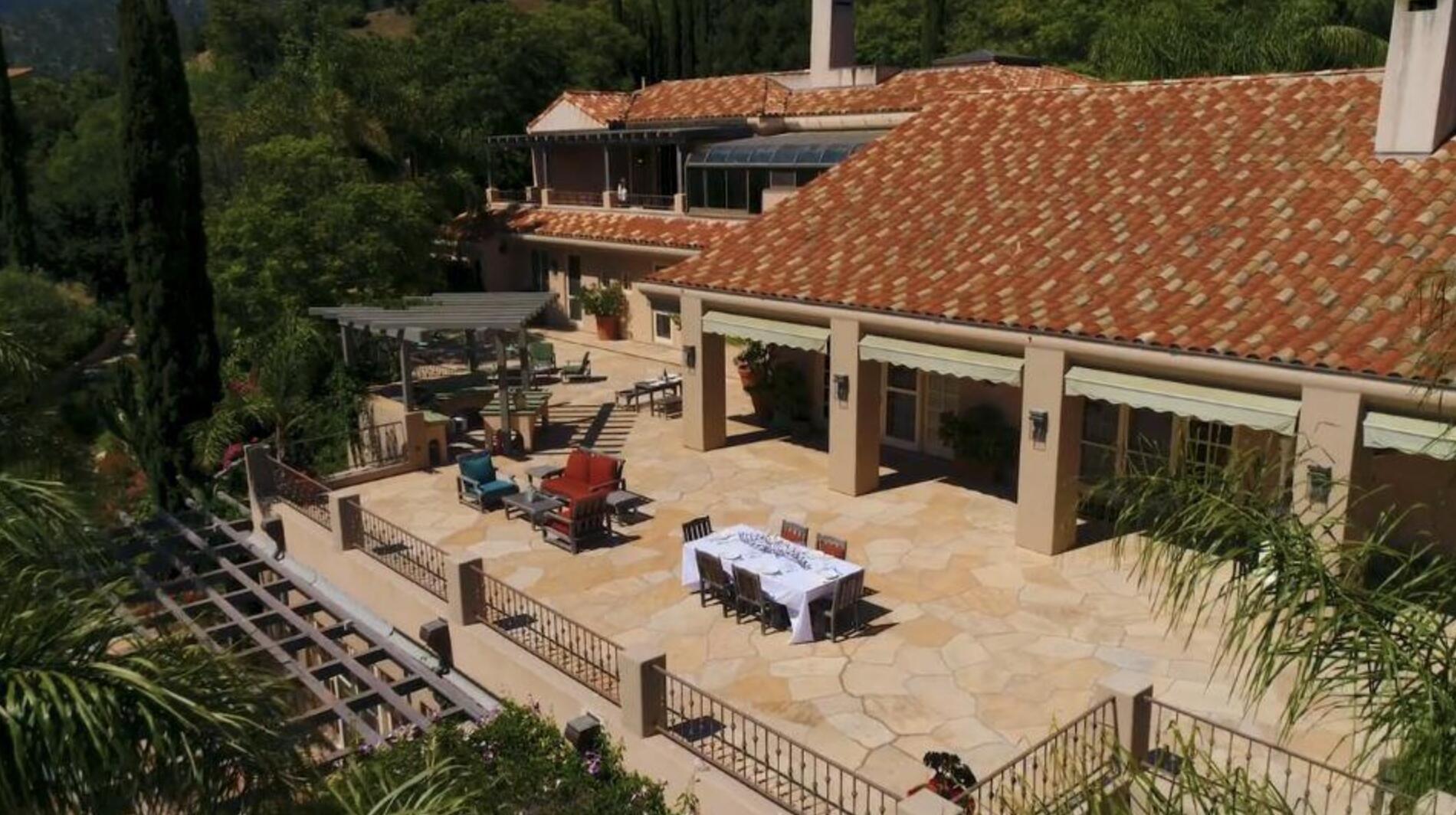 3756 Foothill Road Santa Barbara, CA 93105 - Photo 50 of 70 a view of a patio with couches table and chairs and potted plants