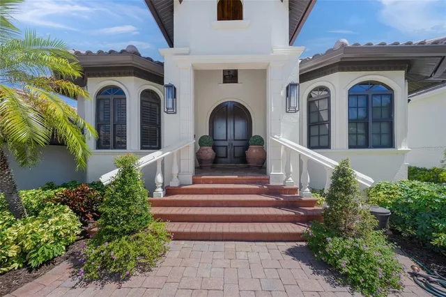 a bedroom with a bed and a mirror