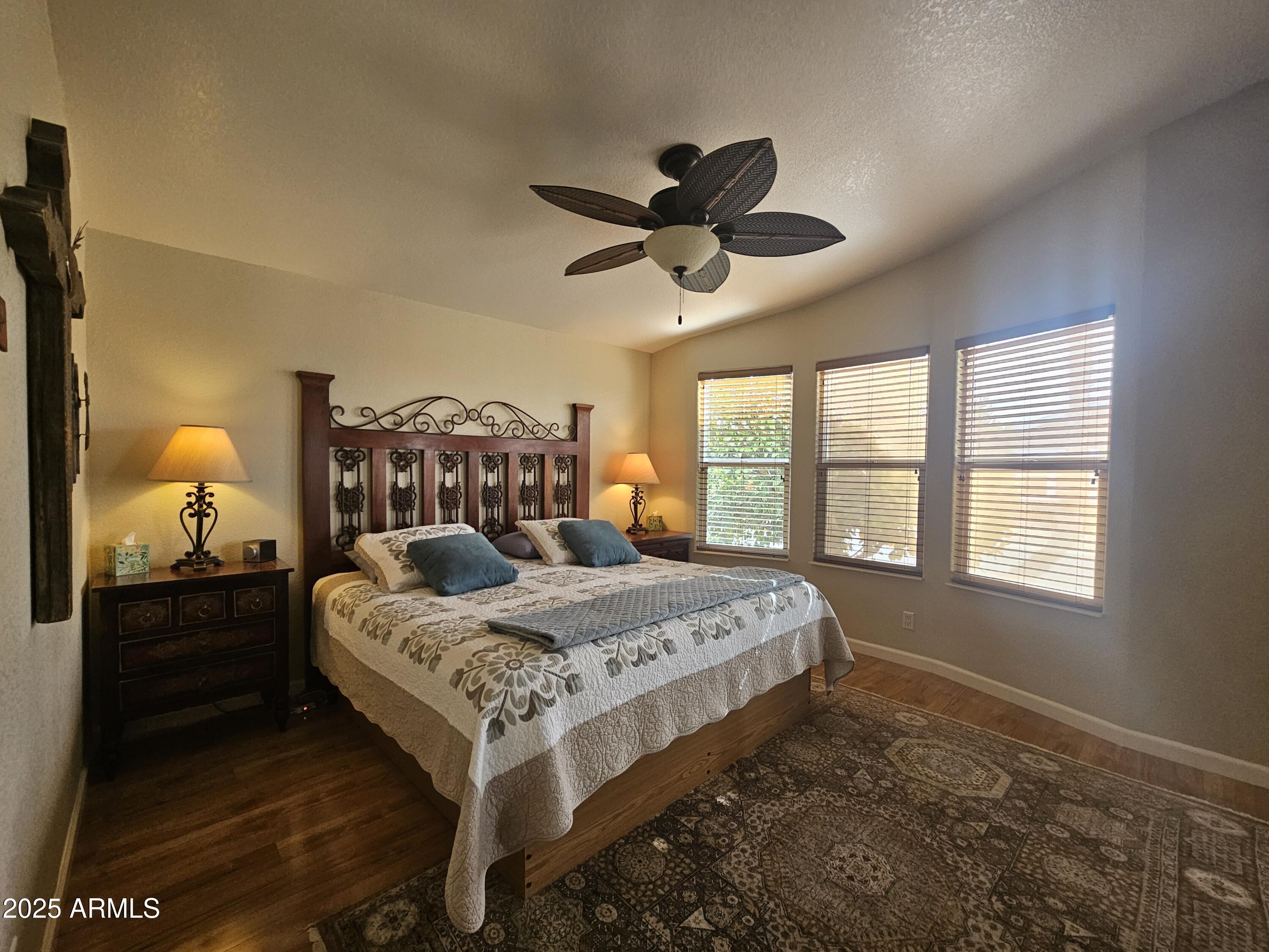 650 North Hawes Road, Unit 4820 Mesa, AZ 85207 - Photo 13 of 54 a bedroom with a bed and window