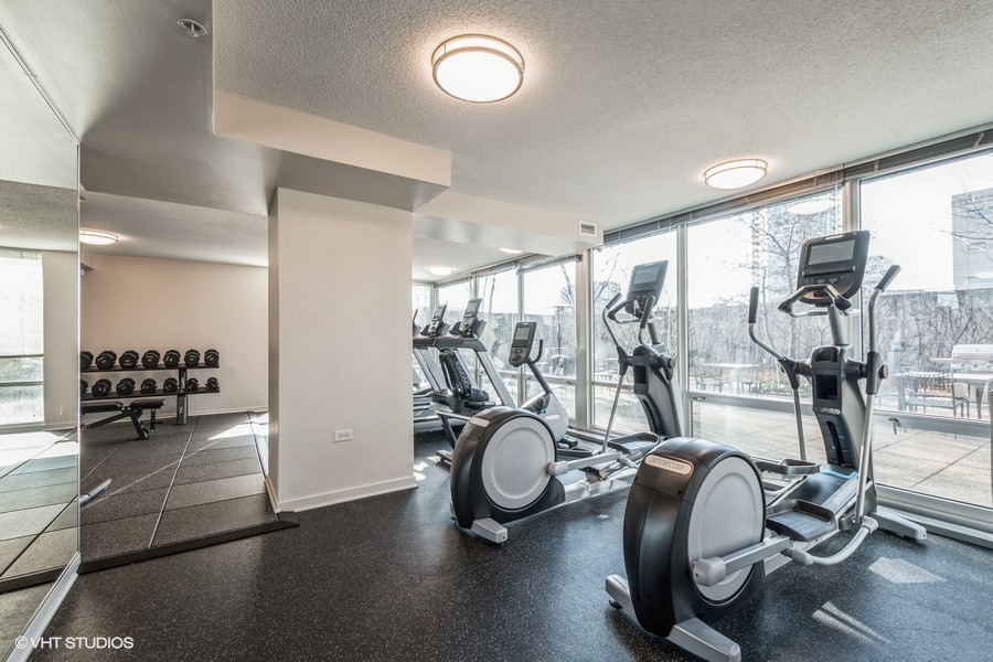 800 Elgin Road, Unit 517 Evanston, IL 60201 - Photo 18 of 20 a view of a room with gym equipment