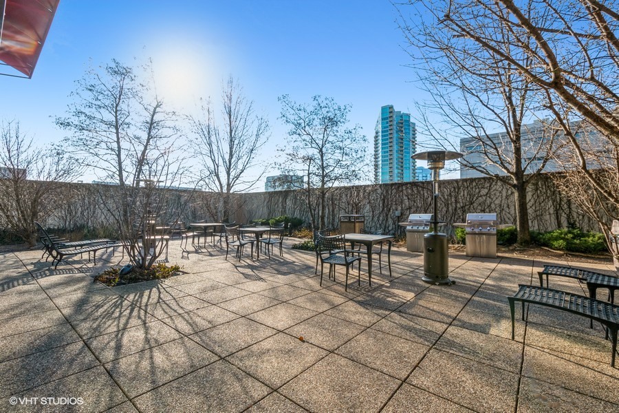 800 Elgin Road, Unit 517 Evanston, IL 60201 - Photo 19 of 20 a view of backyard with sitting area and outdoor seating